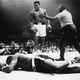 25 MAY 1965: CASSIUS CLAY OF THE UNITED STATES STANDS OVER THE PRONE FIGURE OF HEAVYWEIGHT CHAMPION SONNY LISTON DURING THEIR BOUT HELD IN LEWISTON, MAINE. CLAY WON THE FIGHT WITH A FIRST ROUND KNOCK-OUT TO CLAIM THE TITLE.
Allsport Hulton/Archive